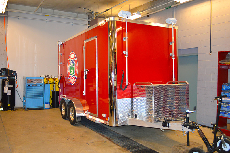 wide view of air 12 trailer with big sky fire department logo