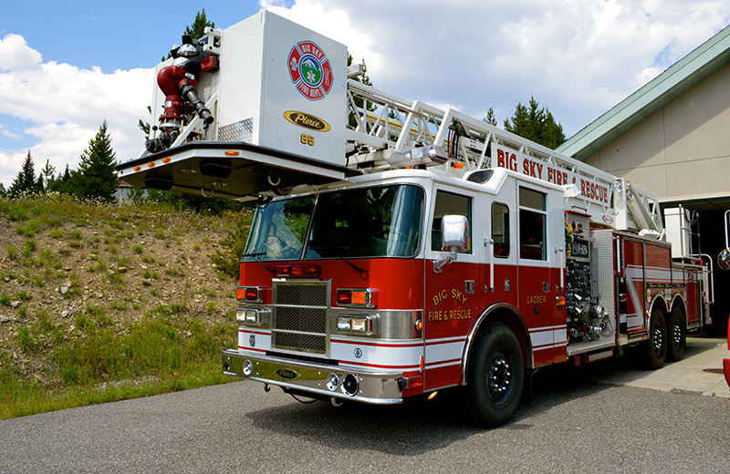 ladder 12 firetruck in front of big sky firehouse