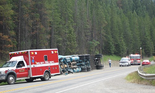 semi truck accident with two big sky fire trucks at the scene